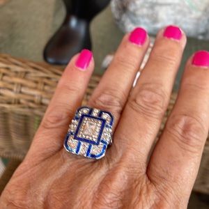 Gorgeous 925 silver ring with sapphire. Prettier in person. Size 7